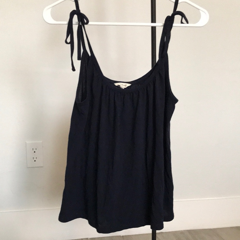 Madewell navy tank top with string straps.